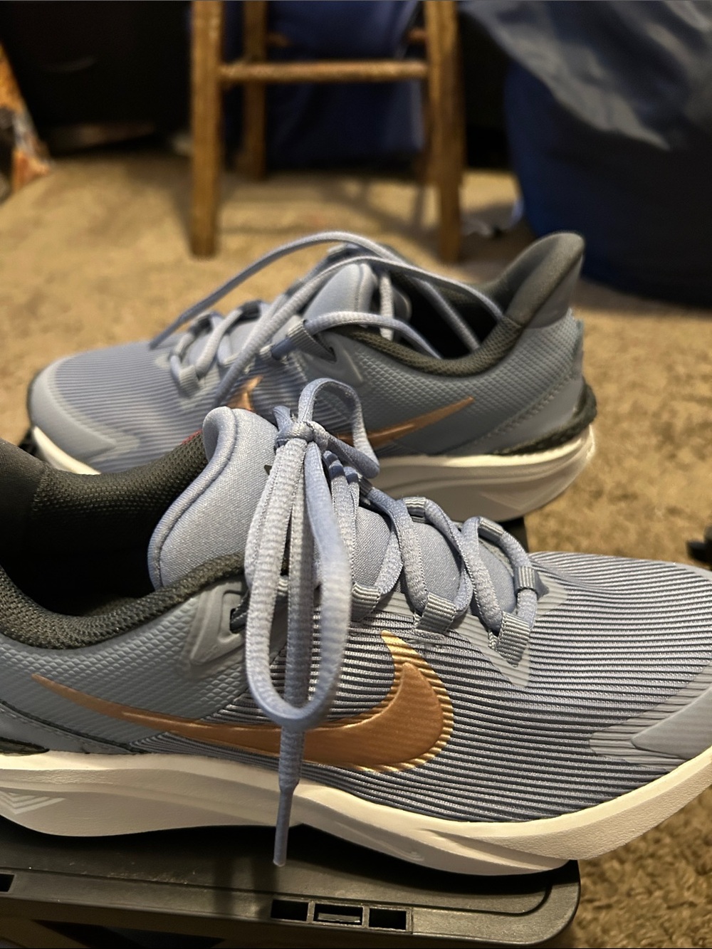 Nike Women’s Light Blue Athletic Sneakers with Gold Swoosh